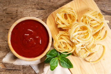 Dried pasta fettuccine with ingredients