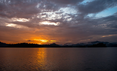 beautiful sunset view in lake at Cheow Lan Dam (Ratchaprapa Dam)
