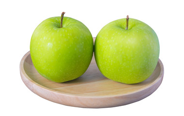 Moist Green apples in dish wooden, isolate on white background.