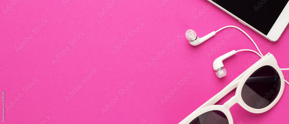 Wall mural studio shot of white accessories on magenta back