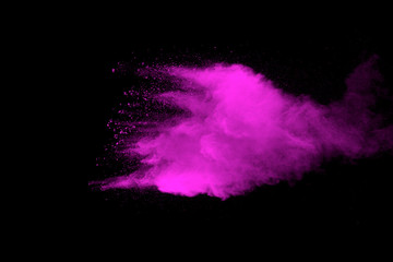 Explosion of pink dust on black background. - 276365390