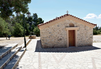 Fototapeta na wymiar small Greek church on a mountain