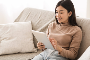 Teen Girl Watching Media Content on Tablet