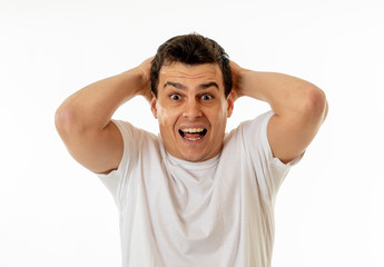 Portrait of amazed man feeling lucky, happy and surprised of winning something and being successful