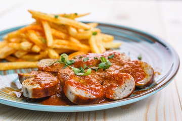 Fried sausages with French fries