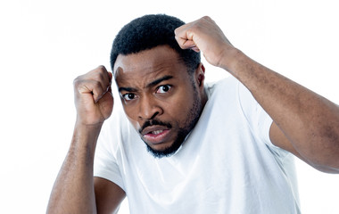 Close up portrait of concern scared shocked adult man with a terrified facial expression