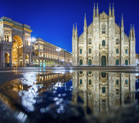 Fototapeta na wymiar Milan Piazza del Duomo square. City center illuminated at night. Milano, Italy