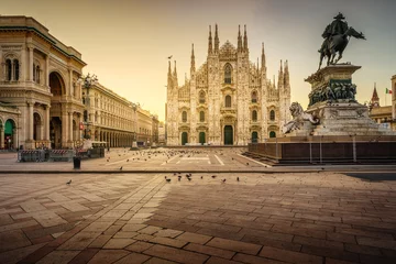  Milan Piazza del Duomo square. City center illuminated in the sunrise. Milano, Italy © Ivan Kurmyshov