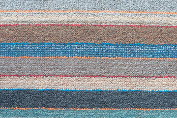 Striped  colorful rug for background.