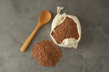Linen. Flax seeds. Dark background. Healthy food concept.