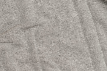 Pure linen texture. Wrinkled linen fabric background. 