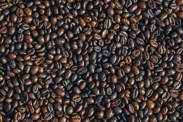 Obraz premium Coffee background, macro photo. Roasted coffee beans