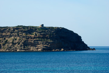 Fototapeta na wymiar Veduta della torre di Capo Mannu
