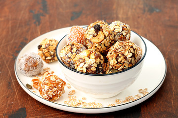Raw vegan sweets, energy balls with dried fruits and nuts 
