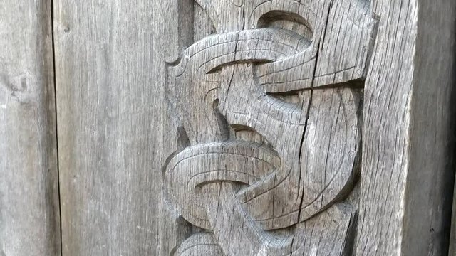 Detail of a old viking wooden door in Sweden.