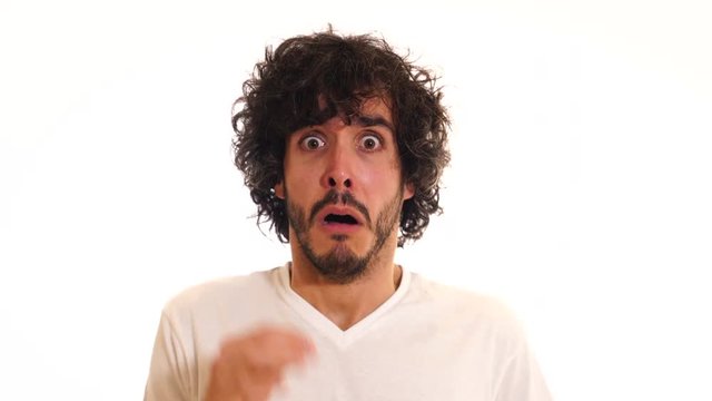People, human emotions and expressions. Attractive man looking happy sad scared depressed surprised emotional excited and crazy.