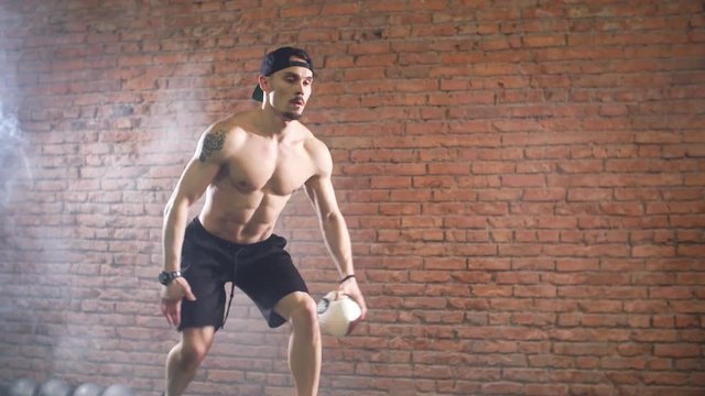 Athlete practicing plyometric exercise on jump box getting his blood pumping.