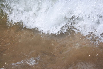 Waves at the sea spanish beach Huelva