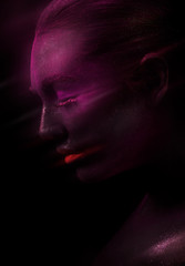 Model with purple face and red lips