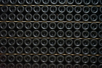 background texture of bottle in wine cellar