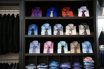 Assortment of classic shirts at menswear store