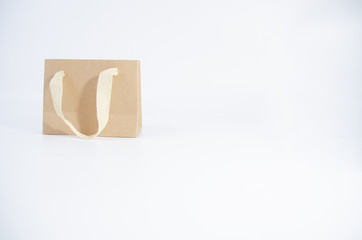 Brown paper bag isolated on a white background.Copy space.