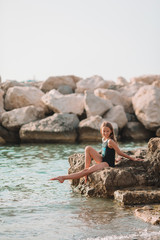 Cute little girl at beach during summer vacation