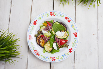 grilled vegetables on the wooden background