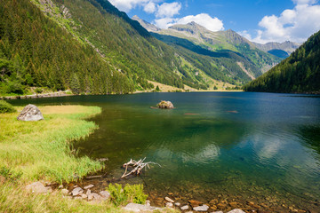 Fototapeta na wymiar Alpine mountain lake Riesachsee near Schladming in Austria