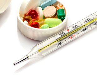 Thermometer with temperature. Medicines tablets