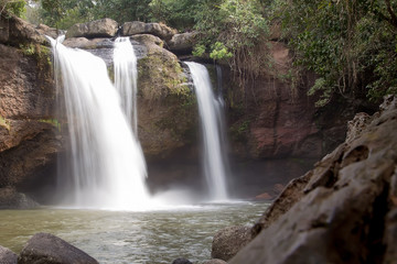 Fototapeta na wymiar Heo Suwat Waterfall locate at Khao Yai National Park, Thailand. A beautiful waterfall in the deep forest.