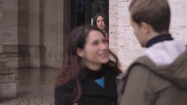 relationships, betrayal, infidelity. woman spying on her boyfriend betraying her