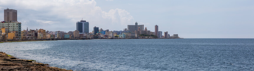 Fototapeta premium Panoramic view of the Old Havana City, Capital of Cuba, during a sunny and cloudy day.
