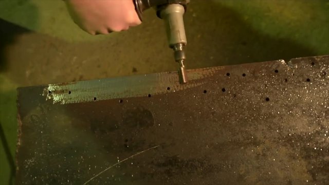 deburring a metal part