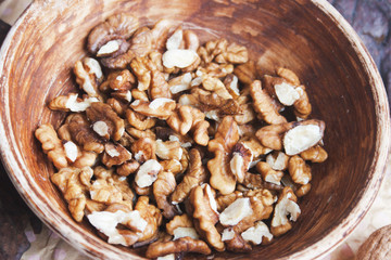 Walnuts  grains in a bowl. Candid.