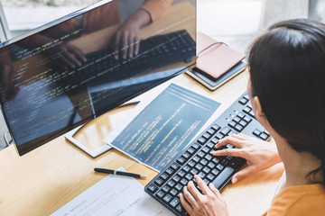 Young Professional programmer working at developing programming and website working in a software...