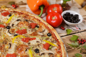 Vegetarian pizza on wooden table