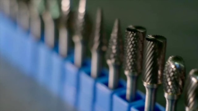 A row of small cutters, close-ups smooth panorama