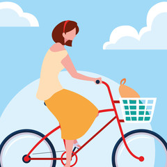 young woman riding bike with sky and clouds