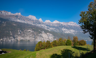 rural view on Walensee lake in Switzerland surounded by mountains
