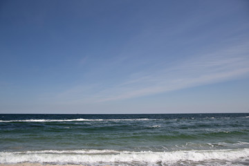 Fototapeta premium splashing wave sea water sunny day spray splatter nature