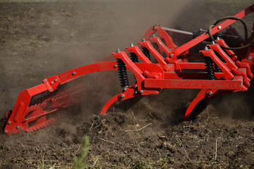 Agricultural plow close-up on the ground, agricultural machinery.