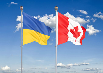 Ukraine vs Canada. Thick colored silky flags of Ukraine and Canada. 3D illustration on sky background. – Illustration