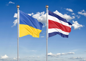 Ukraine vs Costa Rica. Thick colored silky flags of Ukraine and Costa Rica. 3D illustration on sky background. – Illustration