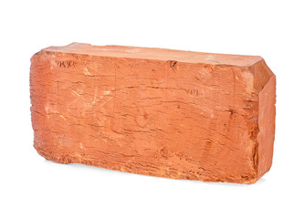 Old red brick isolated on a white background, closeup. Full depth of field.