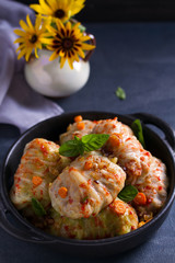 Stuffed cabbage leaves with meat, rice and vegetables. Chou farci, dolma, sarma, sarmale, golubtsy or golabki - popular dish in many countries