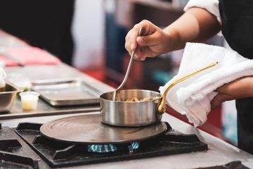 Chef preparing food in the kitchen, chef cooking