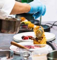 Chef preparing food in the kitchen, chef cooking