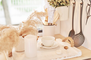 Decor and dishes in a motor home on a white background
