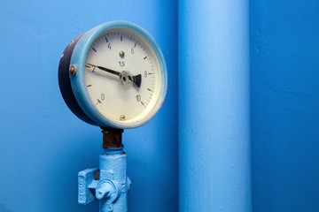 Manometer of center plumbing system with indicator of pressure  on the big diameter water pipe of...